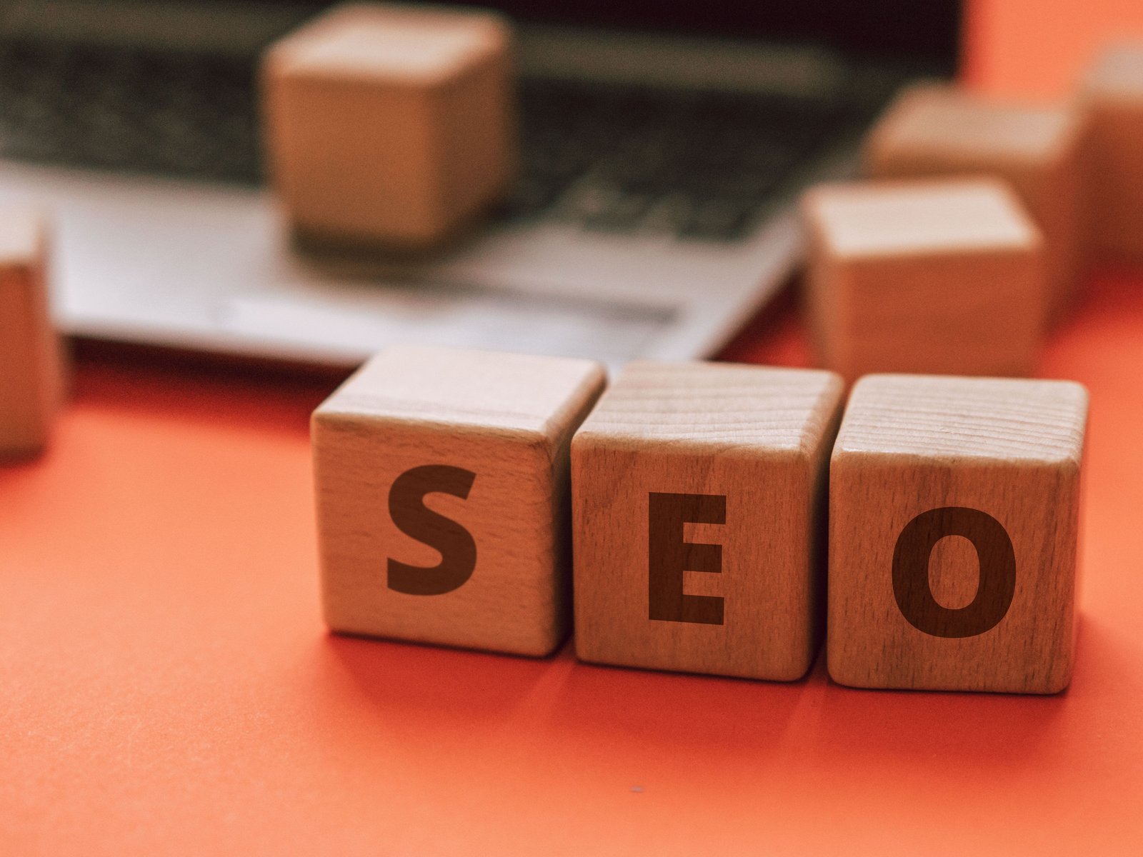 Wooden blocks spelling SEO representing search engine optimization services